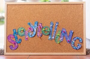 Colourful letters spelling “storytelling” on a noticeboard, representing brand storytelling for small businesses.